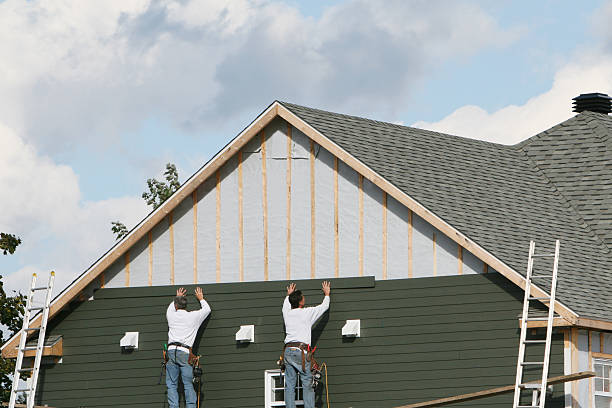 Professional Siding technician working in Morton Grove, IL